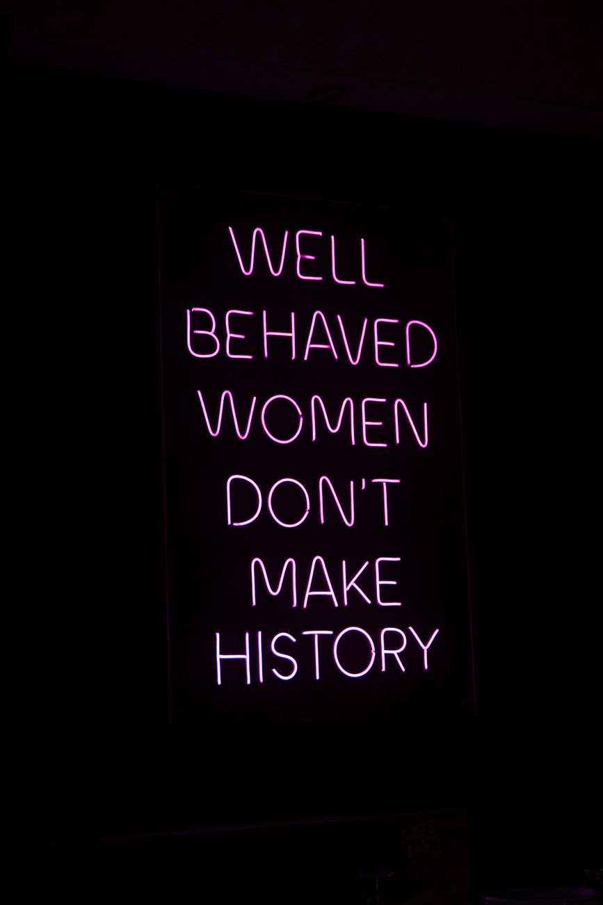 pink neon lights on black background